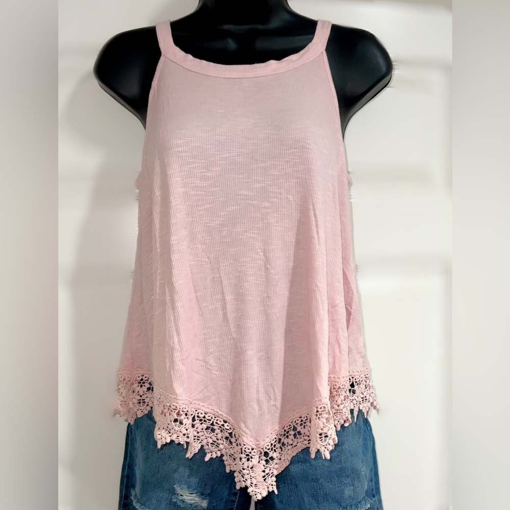 Women’s pink lose fitting sleeveless top with lace trim at bottom.  Size S